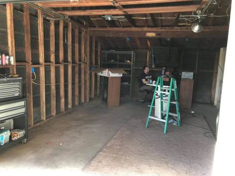 Our Garage Renovation - The April Blake Old Garage Renovation, Office Laundry Room, And So It Goes, Backyard Garage, Garage Door Styles, Attic Doors, Wood Plank Flooring, Garage Renovation, Garage Door Makeover