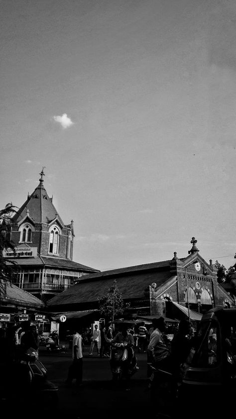 Mandai Market officially known as Mahathma Phule Mandai. It is the biggest vegetable market in Pune city, India.The construction of the Gothic style building started in 1882 and took 4 years for completion. The builders used masonry carved from the local grey stone. The tower is surrounded by a verandah with a tiled roof. The market is entered via gothic arches located at the ends of each of the wings. . . . #love#photography📷 #perspective #mandai #punemandai #punemandaimarket #minimalphotograp Pune City Photography, Photography Perspective, Pune City, Gothic Arches, Vegetable Market, Architecture Design Process, City People, The Gothic, Black N White Images