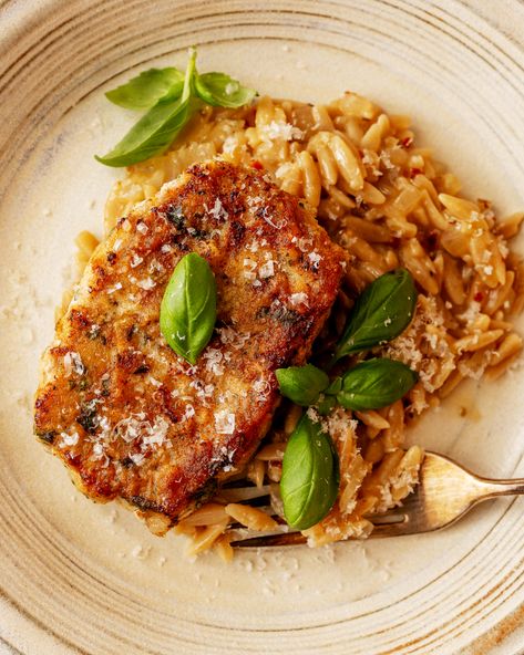 Basil-Parmesan Pork Chops | Tried and True Recipes Pork Chop And Orzo Recipes, Pork Chops And Risotto, Pork Chops And Orzo, Healthy Pork Recipes For Dinner, Pork Chop Pasta Recipes, Pork Chops With Basil, Lemon Basil Pork Chops, Pork Chops With Thyme, Pork Chop Italian Recipes