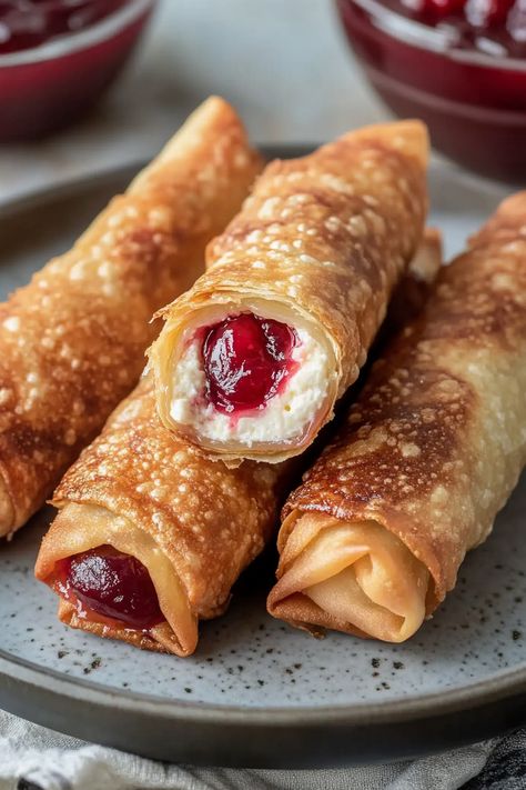 Cheesecake Wontons Air Fryer, Cherry Egg Rolls, Dessert Egg Rolls Air Fryer, Desert Wontons, Egg Roll Wrap Recipes, Cherry Cheesecake Egg Rolls, Egg Roll Dessert Recipes, Air Fried Desserts, Cream Cheese Egg Rolls