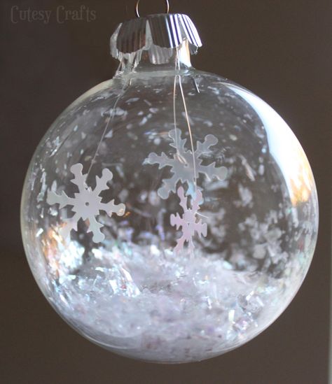 I couldn’t do a 12 Days of Handmade Christmas Ornaments series without making a glass ball ornament, so for day ten I filled one with some pretty fake snow and snowflakes.  I love the way the snowflakes reflect the light! I used the same glittery fake snow that I used for my snow globe ornament.  … Glass Ornaments Diy, Clear Christmas Ornaments, Clear Glass Ornaments, Diy Christmas Ornament, Diy Christmas Tree Ornaments, Clear Ornaments, Glass Ball Ornaments, Diy Valentines Crafts, Christmas Ornaments Homemade