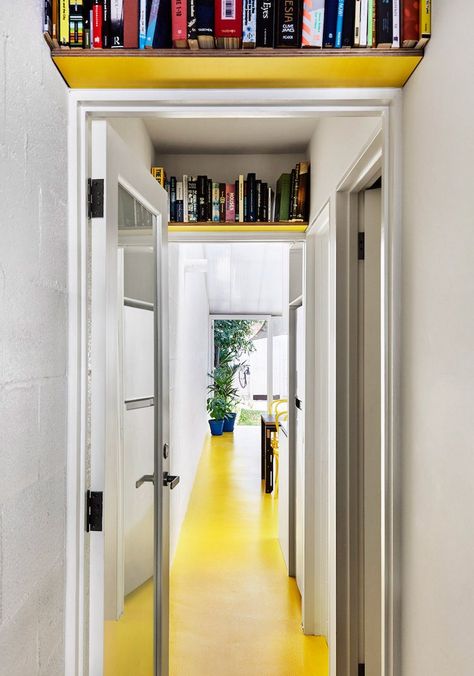 Small space storage is looking up. Shelves installed above door frames make use of otherwise wasted space. Home Office Storage Ideas, Book Storage Small Space, Office Storage Ideas, Craft Storage Ideas For Small Spaces, Creative Bookshelves, Dream Library, Small Space Storage, Small Space Diy, Home Office Storage