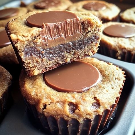 Peanut Butter Cup Stuffed Brookies Peanut Butter Cup Stuffed Brookies Recipe, Peanut Butter Cup Stuffed Brookies, Peanut Butter Stuffed Brookies, Gourmet Peanut Butter Cups, Brookie Muffins, Peanut Butter Cup Brookies Recipe, Mini Brookies, Monster Brookies, Brookie Cups