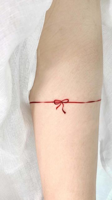 Tattooist_Yoda(요다) on Instagram: "❤️ Done at @42.west" Red Ribbon Of Fate Tattoo, Red Words Tattoo, Red Line Tattoo Arm, Red Thread Of Fate Tattoo, Red Thread Tattoo, Red String Of Fate Tattoo, Red Back Tattoo, Red String Tattoo, Sailors Knot