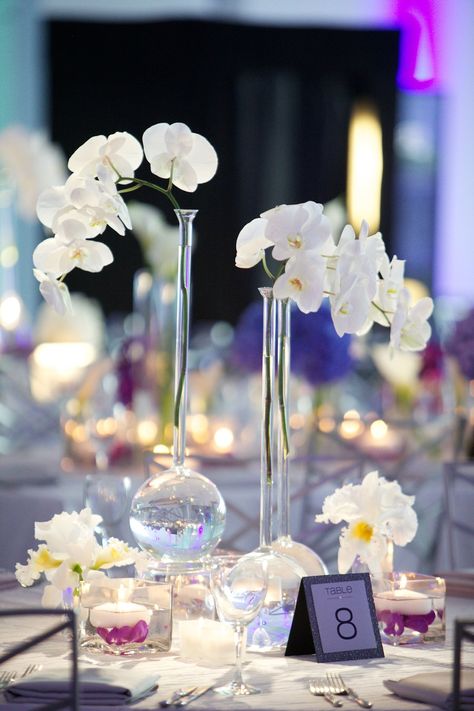 Blue Floating Candles, Orchid Centerpieces Wedding, Centerpieces For Weddings, Purple Wedding Centerpieces, Purple And Silver Wedding, Silver Wedding Decorations, Blue White Weddings, Orchid Centerpieces, Modern Centerpieces