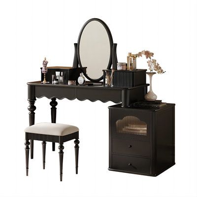 Immerse yourself in the elegance of this Black Vintage Solid Wood Makeup Desk, a perfect blend of French classic and modern design. Crafted from the durable and moisture-resistant Golden Sandalwood, this piece promises longevity and enduring quality. With a spacious desktop and ample legroom, it provides a comfortable and roomy space for daily grooming or meticulous care. The wavy drawer design and accordion shutter door exude a vintage French charm in every detail. The pure copper vanity mirror Vanity Ideas Bedroom Black, 1850s Furniture, Vintage Makeup Desk, Makeup Vanity Black, Goth Makeup Table, Gothic Makeup Vanity Ideas, Black Victorian Vanity, Black Vanity Art Deco, Black Shabby Chic