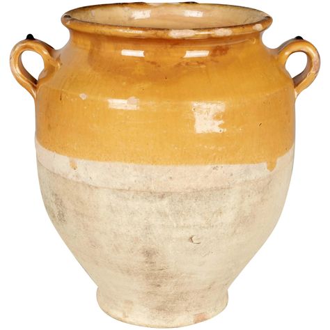 A 19th century earthenware confit pot from the Southwest of France with traditional yellow glaze. Chips, cracks and losses to glaze. These ordinary earthenware vessels were once used daily in the French country home and have beautiful rustic glazes of green, ochre and terracotta. Nice decorative elements especially when several sizes and shapes are grouped together. Weight: 4.8 lbs. Please refer to photos for more details. Circa 1880-1900. 10.75'H x 10.5'W x 8.75'D French Terracotta, Flower References, Glass Fashion, Stone Vase, Earthenware Pottery, Glaze Ideas, Concrete Pots, Ceramic Pots, Porcelain Pottery