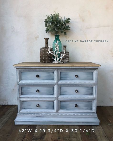 Coastal Inspired Dresser painted in lots of calming hues. I added planks to the top to continue the Beachy vibe. Available for local pick Painted in layers of #fusionmineralpaint #homestead blue #soapstone #sterling #dixiebellepaint #bestdangwax #grungegray #dresser #buffet #fixerupperinspired #fixerupper #chalkpaintedfurniture #beachy #layers #coastalliving #farmhousebuffet #entryhall #furnituremakeover #upcycledfurniture #paintinginlayers #interiordesign #blended #sandiego #poway #furniture # Dresser Color Ideas, Beachy Layers, Whitewash Dresser, Beachy Furniture, Farmhouse Buffet, Dresser Painted, Diy Room Decor Videos, Driftwood Art Diy, Dresser Furniture