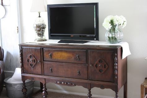 television console decor | Antique buffet as TV console | Furniture and Decor Antique Sideboard As Tv Stand, Antique Sideboard Buffet Tv Stands, Antique Buffet Tv Stand, Antique Media Console, Antique Dresser As Tv Stand, Tv Stand Traditional, Tv On Buffet Cabinet, Buffet As A Tv Stand, Buffet As Tv Stand In Living Room