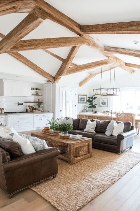 Enhance your home’s character with exposed wooden ceiling beams. Whether you’re going for a farmhouse look or a modern rustic vibe, wooden beams add depth and style. 🏠✨🌲 #WoodenBeams #CeilingDesign #HomeDecor #RusticCharm Post And Beam Homes Interior, Lighting On Beams, Wooden Ceiling Beams, Beam House, Wooden Beams Ceiling, Post And Beam Home, Angled Ceiling, Wooden Ceiling, Farmhouse Look