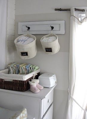 Hang diaper baskets above changing table with little surface space Baskets On Wall For Storage, Changing Table Storage, Cloth Diaper Storage, Diaper Storage, Baby Room Neutral, Baby Clothes Organization, Room Shelves, Nursery Storage, Baby Organization