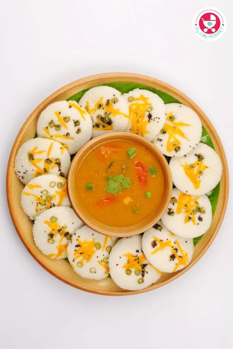 A creative approach to improve the idli dish, making it more wholesome and delicious! Mini vegetable idli , which is a fantastic and enlightening breakfast/dinner in and of itself. Your child’s face will likely light up when you serve them colorful, healthy chutney with adorable mini vegetable idli. The recipe for today’s delicious and easy mini veg idli. Benefits Of Rice, Healthy Bowel Movement, Green Capsicum, Idli Recipe, Breakfast Dinner, Variety Of Fruits, Shredded Carrot, Led Weaning, Breakfast For Dinner