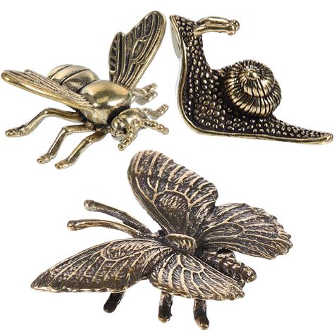 PRICES MAY VARY. Bring the Beauty of Nature Indoors: Looking for unique and stylish home decor that adds a touch of nature to your living space? Look no further than our stunning collection of brass animal figurines! Our eye-catching 3D bee design, along with our charming brass butterfly and snail decor, will add a touch of nature to your home. These stunning brass figurines are the addition to any home decor, adding a festive and stylish accent that will impress your guests. Premium Quality: Ou Bee Figurine, Snail Decor, Metal Bee, Brass Butterfly, Folk Decor, Brass Animals, Brass Figurines, Ornament Diy, Gold Animals