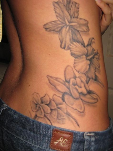 I like the angling of the flowers Flower Side Tattoo, Hawaiian Flower Tattoos, Plumeria Tattoo, Side Tattoos Women, Rose Tattoos For Women, Flower Wrist Tattoos, Sick Tattoo, Flower Tattoo Shoulder, Hawaiian Tattoo