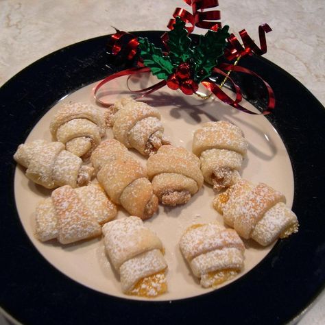 Nut Horns (yeast cookie) Recipe | Just A Pinch Recipes Nut Horns, Horn Cookies, Butter Horns, Cream Horn, Nut Rolls, Yeast Dough, Roll Cookies, Egg Yolks, Sweet Potato Casserole