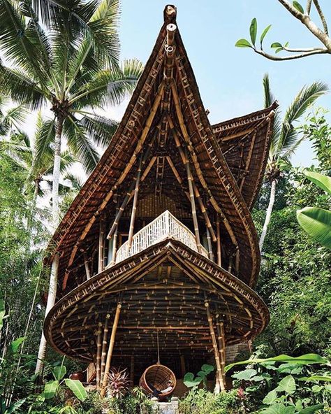 this all bamboo village in Bali is taking eco-tourism to the next level. | Photo Credit: Stephen Kent Johnson House In Bali, Bali Architecture, Bamboo Building, Bamboo House Design, Bamboo Structure, Bamboo Architecture, Tree House Designs, Stunning Interior Design, Bamboo House