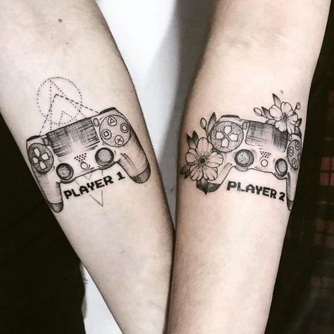 Player 1, Player 2, matching couple tattoos of controllers on the arm | www.otziapp.com Playstation Tattoo, Partner Tattoos, Video Game Tattoos, Best Couple Tattoos, 16 Tattoo, Gamer Tattoos, Couple Matching Tattoo, Cute Couple Tattoos, Small Couple Tattoos