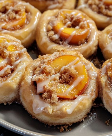 Peach Cobbler Cinnamon Rolls Peach Rolls, Peach Breakfast Recipes, Strawberry Cream Cheese Stuffed French, Peach Cinnamon Rolls, Stuffed Cinnamon Rolls, Peach Cobbler Cinnamon Rolls, Cream Cheese Stuffed French Toast, Peach Cobbler Muffins, Breakfast Roll