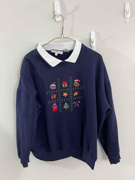 Get into the holiday spirit with this vintage Highgate II Christmas sweater in a beautiful blue color. The tight-knit fabric and collared neckline make it perfect for a casual occasion, while the embroidered accents and pullover style add a touch of elegance. This sweater is available in size 1X, with a regular fit and long sleeves, making it suitable for plus-size women.  The sweater is perfect for any season, be it winter, summer, fall, or spring, and is sure to make you stand out with its uni Christmas Sweater Outfits, Vintage Christmas Sweater, Dog Lover Sweatshirt, 90s Clothes, Cute Christmas Sweater, Vintage Christmas Sweaters, Christmas Pullover, Dog Mom Sweatshirt, Upcycle Sweater