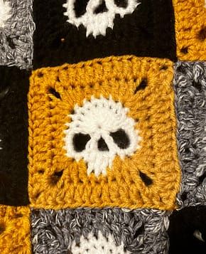 Granny Square Skull Sweater – FREE Pattern - Sara Rosado Gothic Crochet Granny Square, Crochet Random Granny Square Blanket, Halloween Granny Square Crochet Patterns Free, Skull Motif Crochet Pattern, Skull Granny Square Sweater, Skull Crochet Granny Square Pattern, Knitted Skull Pattern, Pixel Crochet Halloween, Skull Granny Square Blanket