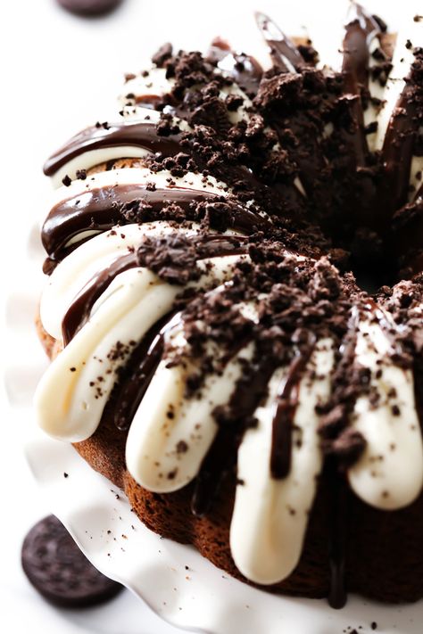 This Cookies and Cream Bundt Cake is divine. It is loaded with Oreo cookies. It is super moist and is topped with cream cheese frosting that compliments the chocolate cake perfectly! Cookies And Cream Bundt Cake, Mini Bundt Cakes Recipes, Bundt Pan Recipes, Cookies And Cream Frosting, Oreo Buttercream, Nothing Bundt Cakes, Cookies And Cream Cake, Mini Bundt Cakes, Bundt Cakes Recipes