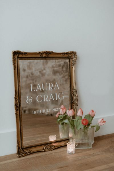 Here’s a Q&A talking you through how the wedding stationery collections work – what they are, their inspiration, how they can be customised, and when you should be thinking about getting them sorted… Wedding welcome sign on vintage mirror. Styling, Stationery and floristry - Gloam Photographs - Claire Fleck Venue - Guardswell Farm #weddingstationery #modernwedding #modernweddingstationery #weddinginspo #weddingideas Old Mirror Wedding Sign, Small Mirror Welcome Sign, Vintage Frame Wedding Sign, Antique Mirror Wedding Sign, Large Mirror Wedding Sign, Vintage Mirror Welcome Sign, Farm Style Wedding Decor, Wedding Greeting Table, Vintage Mirror Wedding Sign