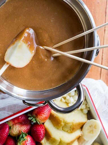 Peanut Butter Fondue Recipe | Allrecipes Evaporated Milk Desserts, Peanut Butter Fondue, Broth Fondue Recipes, Raclette Recipes, Dessert Fondue, Fresh Pumpkin Pie, Fondue Night, Rhubarb Desserts, Milk Dessert