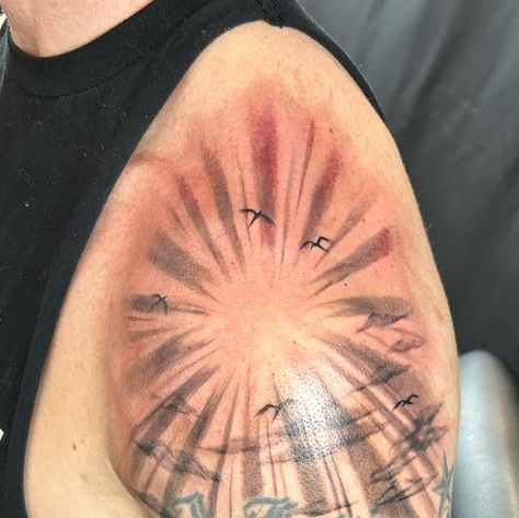 Mayhem Tattoo, Salem on Instagram: "Katie added some sun rays on shoulder  (other tattoo done by another artist)" Sun Ray Tattoo Design, Sunrays Tattoo Design, Ray Tattoo Design, Sun Ray Tattoo, Mayhem Tattoo, Rays Tattoo, Sun Rays Tattoo, Ray Tattoo, Sun Rays