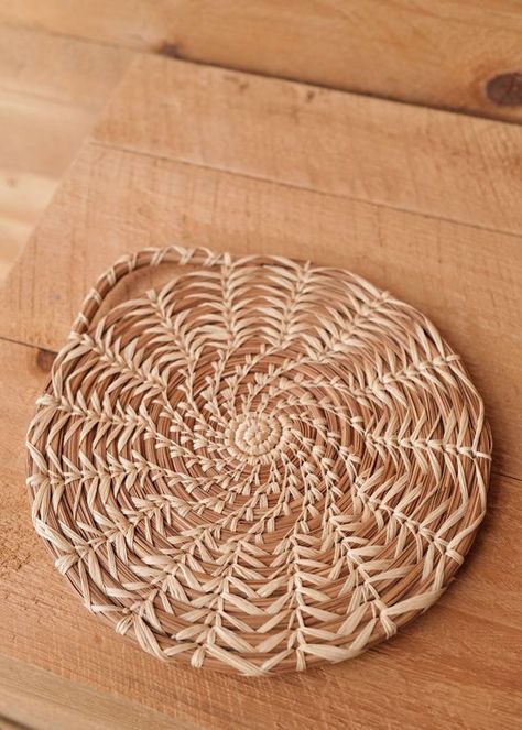 One of our recent favorite finds. Layer in nature with the Maya Pine Needle Trivet. Made from intricately stitched pine needles and raffia, the coasters are handmade by Mayan women in Guatemala. The trivet is heat resistant and is the perfect accent to set on your table to protect it from hot dishes. The beautiful weave also acts as a lovely displayed on the wall when not being used. Fair trade. Explore the Maya Pine Needle Collection. Origin: Guatemala Manufacturing: Handcrafted Material: Susta Pine Needle Hat, Pine Needle Weaving, Pineneedle Baskets, Mayan Women, Pine Needle Crafts, Beach Crafts Diy, Basket Weaving Diy, Basket Weaving Patterns, Beautiful Butterfly Photography