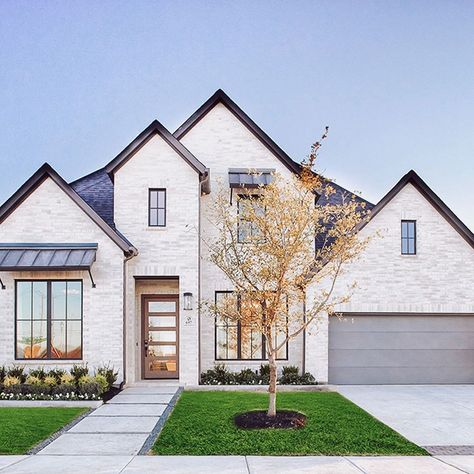 White Brick House Exterior Modern, Texas Brick Homes Exterior, Two Story White Brick House, Henry Brick Avondale, White Brick Black Trim Exterior, Brick And Panel House Exterior, Brick Beach House Exterior, White Brick House With Stone Accents, Light Brick Exterior Color Schemes