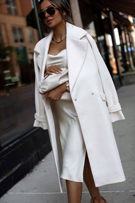 6 Ways to Look More Expensive on a Budget - Mia Mia Mine Satin Dress With Long Coat, White Satin Dress With Blazer, White Coat Long, White Coat For Wedding, Satin Dresses With Blazer, Satin Dress With Coat, Satin Dress And Blazer Outfit, White Dress With Blazer, Satin Dress With Blazer Outfit