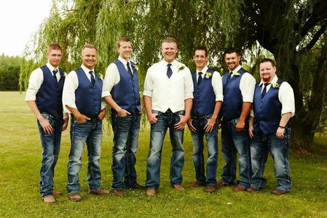 Groom With Jeans And Vest, Navy Vest With Jeans Groomsmen, Groomsmen Attire May Wedding, Groomsmen In Jeans And Vests, Mens Wedding Attire Jeans And Vest, Mens Wedding Vest And Jeans, Country Fall Wedding Groomsmen Attire, Country Wedding Attire For Men, Navy Blue Vest Groomsmen With Jeans