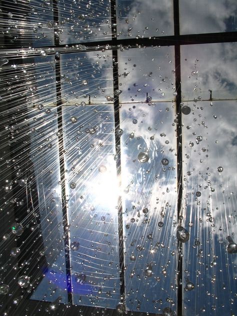 Rain is a 2005 installation of suspended glass water droplets by Chicago artist Stacee Kalmanovsky. She really found a perfect spot to install this, right below the giant sky lights. I bet the refraction of sunlight onto the floor and surrounding walls was gorgeous. (via behance) Rain Art, Hey Arnold, Chicago Artists, Colossal Art, No Rain, Sculpture Installation, Land Art, Pics Art, Rain Drops