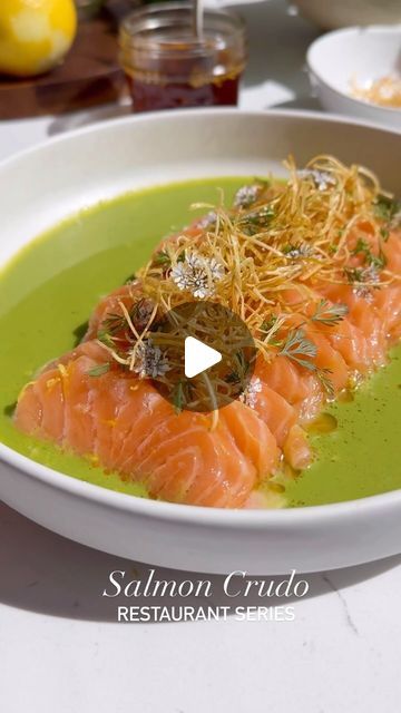 Nadia Aidi on Instagram: "Comment ‘SALMON CRUDO’ and I’ll DM you the recipe for this Salmon Crudo & Cilantro Coconut Sauce for ep.1 of my ‘If I had a restaurant’ series.  This dish more than deserves a spot at my imaginary restaurant.  Pro Tip: save the leek oil for a later use!  Ingredients: * 8 oz sushi grade salmon. * 1 leek (sliced into matchsticks). * 1/3 bunch cilantro. * 2 scallions. * 1/2 tbsp agave syrup. * 1.5 tbsp tamari or soy sauce. * 1 inch ginger. * 1/2 serrano. * 3 tbsp yuzu or lemon juice. * 1 tbsp white miso paste. * 1/3 cup coconut milk. * 1 tsp fish sauce. * 1 tsp sesame oil. * lemon zest. * flaky salt. * cilantro flowers and leeks for topping. * salsa macha. * oil for frying the leeks.  Directions: 1. Slice your leeks into thin matchsticks. Add them to a cold pan and c Leek Oil, Lemon Beurre Blanc Sauce, Sushi Grade Salmon, Salmon Crudo, White Miso Paste, Miso Paste, Coconut Sauce, White Miso, Flaky Salt