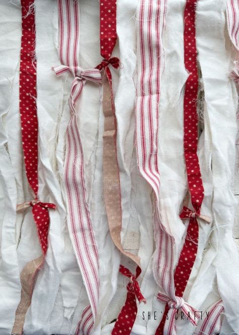 Torn red and white fabric strips on a rag flag. Diy Flag Banner Fabric, Fabric Strip Banner, Diy Flags, Ragged Old Flag, Rag Flag, Tattered Flag, Diy Flag, Fabric Flag, Fabric Flags