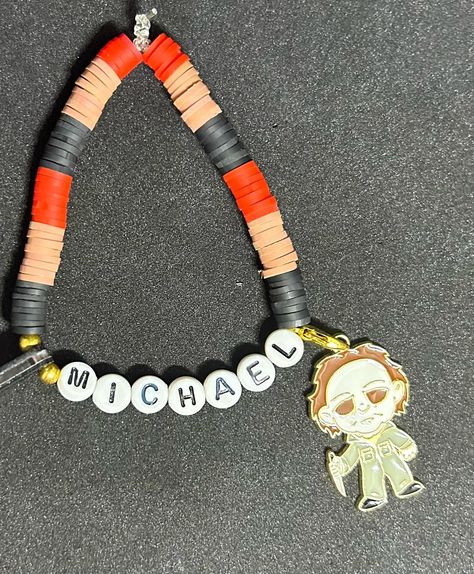 Michael Myers (Horror Film) Heishi Bracelet #handmadebracelet #heishibracelets #beadedbracelets #bracelets #personalizedbracelets #personalizedbracelet #prnnywise #pennywisecosplay #pennywisetheclown #pennywise🎈 #pennywise🤡 #horrorfilm #charmbracelets #charmbracelet #danglebracelet #danglebracelets #michaelmyers #michaelmyersfan #michaelmyersfans #michaelmyershalloween #michaelmyers🔪 Pennywise The Clown, Heishi Bracelet, Dangle Bracelet, Bracelets Ideas, Michael Myers Halloween, Horror Film, Personalized Bracelets, Michael Myers, Horror Films