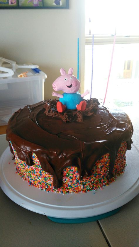 George Pig and muddy puddles sprinkle cake Muddy Puddle Cake, Peppa Muddy Puddles, Peppa Pig Birthday Party Muddy Puddles, George Cake Peppa, Peppa Pig Muddy Puddle Cake, George Pig Birthday Party, Cake With Pigs In Mud, Peppa Pig Muddy Puddles, Peppa Pig Birthday Cake Muddy Puddles