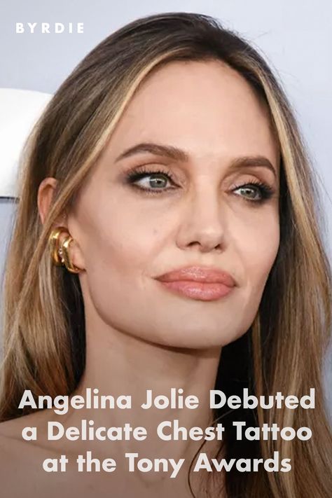 Angelina Jolie Debuted a Delicate Chest Tattoo at the Tony Awards Angelina Jolie Back Tattoo, Multi Hyphenate, Angelina Jolie Hair, Angelina Jolie Tattoo, Angelina Jolie Makeup, Brand New Tattoos, Health Tattoo, Versace Gown, Delicate Tattoo