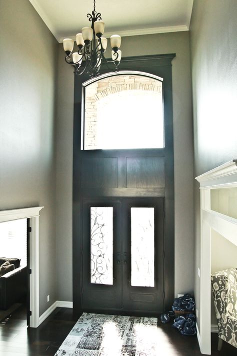 foyer; lighting in a foyer, window above door, entry Ledge Above Front Door, Tall Foyer Lighting, Window Above Front Door, Tall Foyer, Foyer Window, Window Above Door, Girls Bedroom Lighting, Entrance Door Decor, Cottage Front Doors