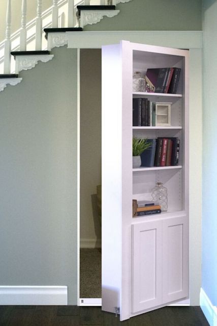 Checkout These Understairs Creative And Practical Space Ideas. Here are ideas for space under stairs. A hidden laundry. The DIY creating a walk in pantry with extra shelves for better organization. Or an extra closet for the spare bathroom.#understairs #storageideas #storage #HomeStorage #smallspace Doorway Bookcase, Secret Door Bookshelf, Door Under Stairs, Hidden Doorway, Room Under Stairs, Space Under Stairs, Closet Under Stairs, Bookshelf Door, Murphy Door