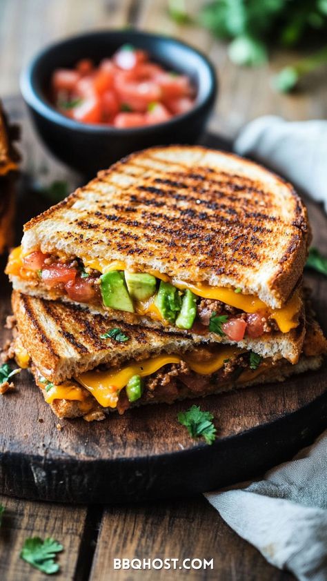 Craving something unique? Try this Taco Grilled Cheese, where your favorite taco ingredients meet the best grilled cheese sandwiches! Packed with ground beef, gooey cheddar, avocado, and juicy tomatoes, this easy grilled cheese recipe is a fun and filling way to satisfy your hunger. Pin it now and click through for the full guide! Taco Grilled Cheese, Unique Grilled Cheese, Fontina Grilled Cheese, Grilled Cheese Recipes Easy, Quick And Easy Comfort Food, Grilled Cheese Sloppy Joe, The Best Grilled Cheese, Easy Grilled Cheese, Grilled Ham And Cheese