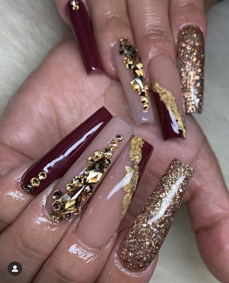 Gold And Burgundy Prom Nails, Burgundy Gold Nails Acrylic, Prom Nails For Burgundy Dress, Burgundy And Gold Nails Acrylic Quince, Burgundy Rhinestone Nails, Burgundy And Champagne Nails, Burgandy Prom Nails, Burgundy Nail Designs With Rhinestones, Burgundy Nail Designs Coffin