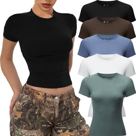 PRICES MAY VARY. High-quality: Crafted from a luxuriously soft and skin-friendly fabric, our basic tops for woman offer a second-skin feel. 5 piece Y2k shirts are made of 90% polyester and 10% spandex. High quality elastic fabric,light weight, super soft and skin-friendly, make you more comfortable to wear. Timeless Crop Tops Design: Discover the charm of our short sleeve t shirts - Going Out Crop Tops for women, Sexy shirts, slim fit crop tops, short sleeve, crew neck, solid color, plain unders Fitted T Shirt Women, Clothes For Women Y2k, Plain Tops For Women, Tight Tops For Women, Amazon Shirts Women, Basic Tees Women, Tight Shirts For Women, Plain Shirts Women, Fitted Shirts For Women