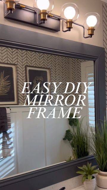 Marian Holden on Instagram: "I’ve done this simple DIY mirror frame in many homes over the years. It is such a simple way to upgrade a builder mirror.

It is also super affordable. I just ust used a 6” baseboard molding. Make sure you paint or stain the back side of the frame as well. You will see that in the mirror if you don’t. And using extreme mount tape is a mess free way to mount the frame. And yes, it sticks really well.

#designerstouch #mirrorframe #diyhomedecor #diyprojects #bathroommakeover" Mirror Border Diy, Bathroom Mirror Makeover Frames, Diy Tile Mirror, Master Bath Mirror, Diy Mirror Frame, Bathroom Mirror Makeover, Bathroom Mirrors Diy, Baseboard Molding, Ala Moana