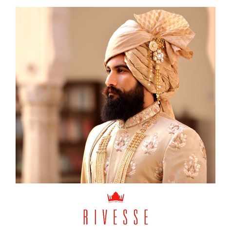 304 Likes, 1 Comments - Rivesse by Ishan Sanghvi (@rivesseclothing) on Instagram: “Creating timeless creations while reawakening the Indian customs with modern silhouettes. #Rivesse…” Gold Bollywood Sherwani With Resham Embroidery, Bollywood Sherwani With Resham Embroidery, Luxury Naqshi Jamawar Sherwani, Royal Long Sleeve Ceremonial Sherwani, Rajwadi Sherwani, Indian Beard Style, Indian Groom Dress, Sherwani For Men Wedding, Groom Dress Men