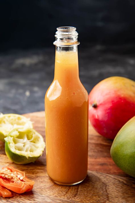 This mango habanero sauce is the perfect complement to wings! Fruity with the right amount of heat, this sauce is oh-so-easy and sure to please. #mango #habanero #easysauce Habanero Sauce Recipe, Mango Habanero Sauce, Wing Sauce Recipes, Habanero Sauce, Homemade Hot Sauce, Chicken Wing Sauces, Habanero Hot Sauce, Mango Sauce, Hot Sauce Recipes