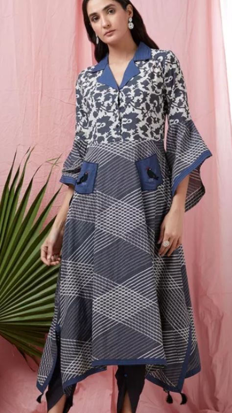 Beautiful Printed cotton Kurti with shawl collar and asymetric bell sleeves. Collar Kurti Design Cotton, Shirt Collar Kurti Design, Shirt Collar Kurti, Collar Kurti Design, Collar Kurti, Indian Kurti Designs, Ikkat Dresses, Stylish Kurtis Design, Girls Dresses Sewing