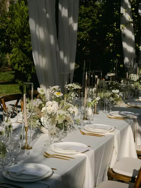 Long Table With Medium-Height White-and-Greenery Centerpieces, Taper Candles Under Drapery Wedding Long Table Flowers, Candle Reception Decor, Long Wedding Table Decorations, Long Table Decorations, Wedding Dinner Table Setting, Long Table Centerpieces, Rustic Italian Wedding, Neutral Wedding Decor, Italian Inspired Wedding