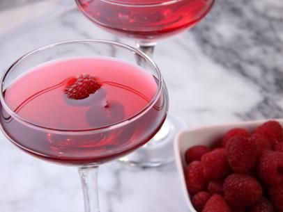 Raspberry Cosmo Recipe | Tia Mowry | Food Network Raspberry Cosmo, Cosmo Recipe, Fruity Alcohol Drinks, Summer Food Party, Refreshing Beverages, Tia Mowry, Raspberry Liqueur, Alcoholic Beverages, Cooking Channel