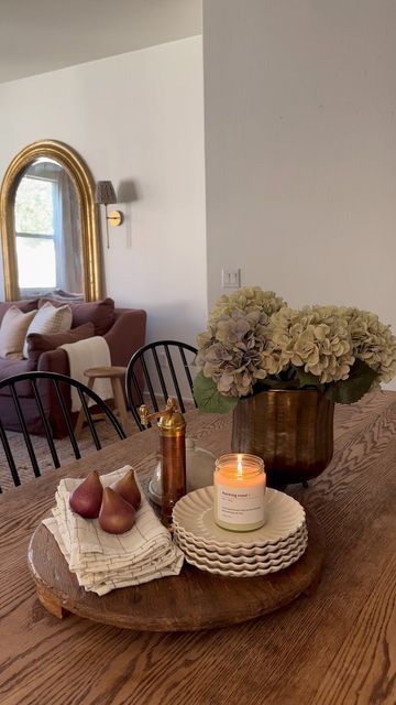 Traditional Dining Table Styling, Middle Of Table Decor Kitchen, Dining Table Decor Vintage, Candles On Kitchen Table, Vintage Centerpieces Dining Room, Brown Dining Table Decor Ideas, Staged Dining Table, Kitchen Table Scapes, Wood Kitchen Table Decor